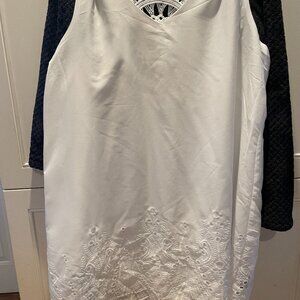 unbranded white lined dress with crocheted details.